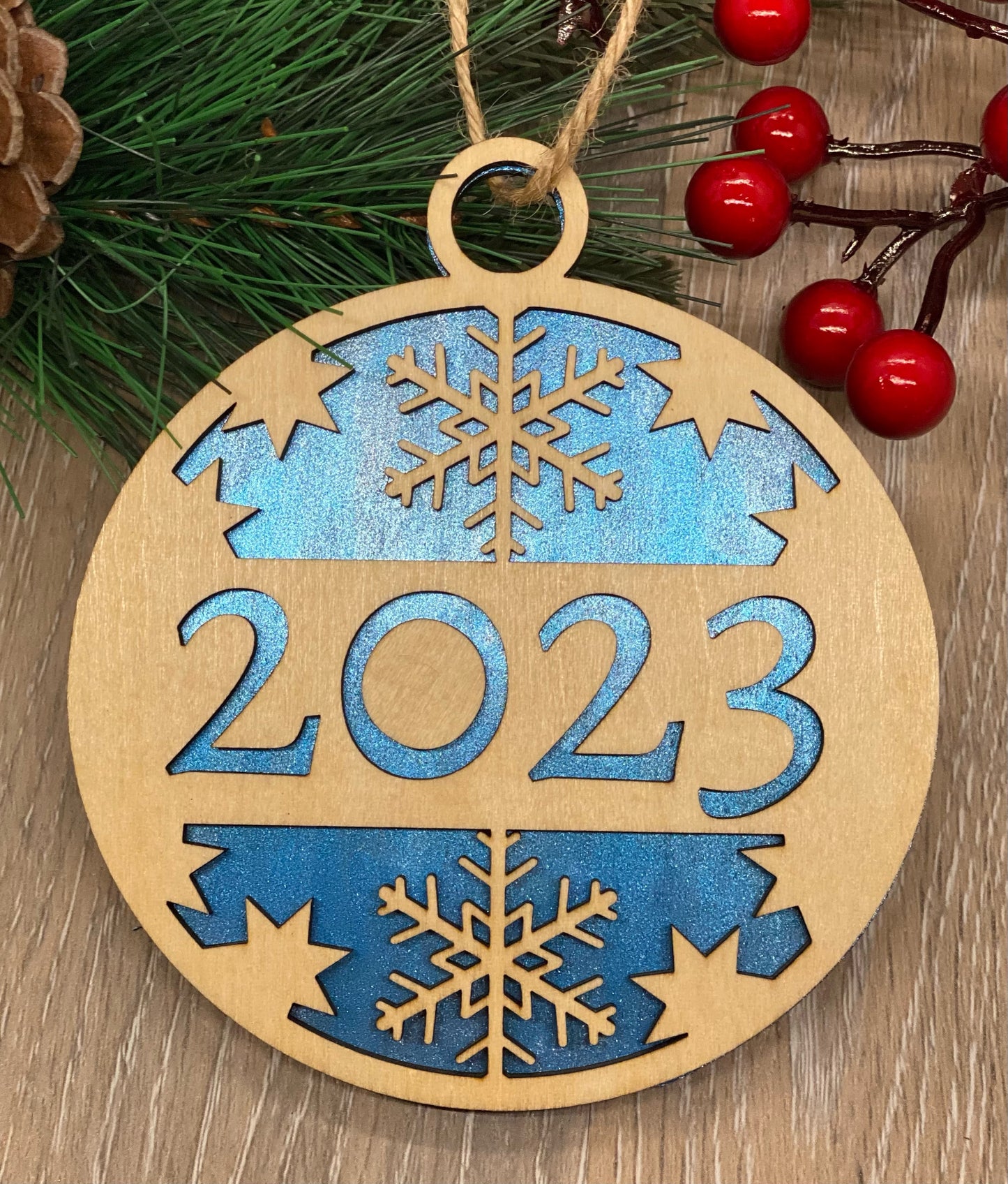 Christmas ornaments with your choice of 2023, Santa in his sleigh, deer and snowflakes, Santa with shades and an elf